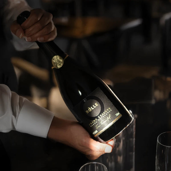 BOLLE Grand Reserve lees-aged non-alcoholic wine being opened at fine dining restaurant, world's only lees-aged alcohol-free wine